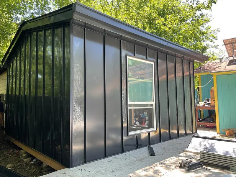 Black standing seam metal wall panels for Roof Inspection in Berwyn