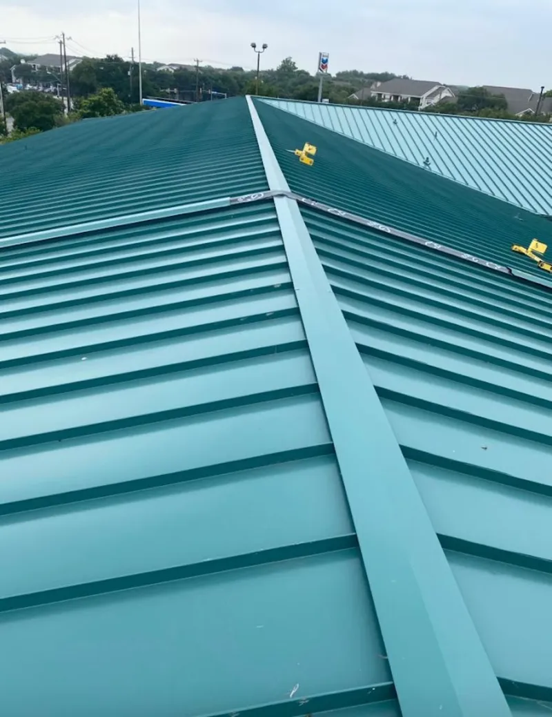 Green commercial metal roof ridge and valley for Metal Roof Repair in Berwyn