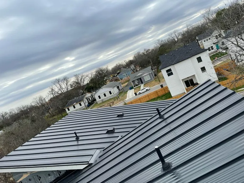 Standing seam metal roof panels with vents for Skylight Repair in Berwyn